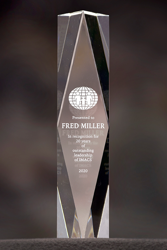 Miller's crystal, in recognition for 20 years of outstanding leadership of IMACS